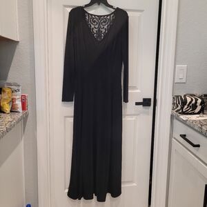 Long Black dress with stunning back scroll work. Sz M